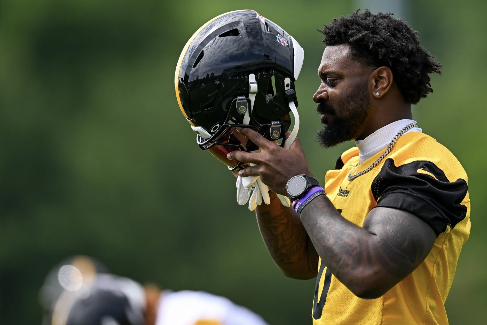 Patrick Queen dons helmet Tuesday on the South Side.