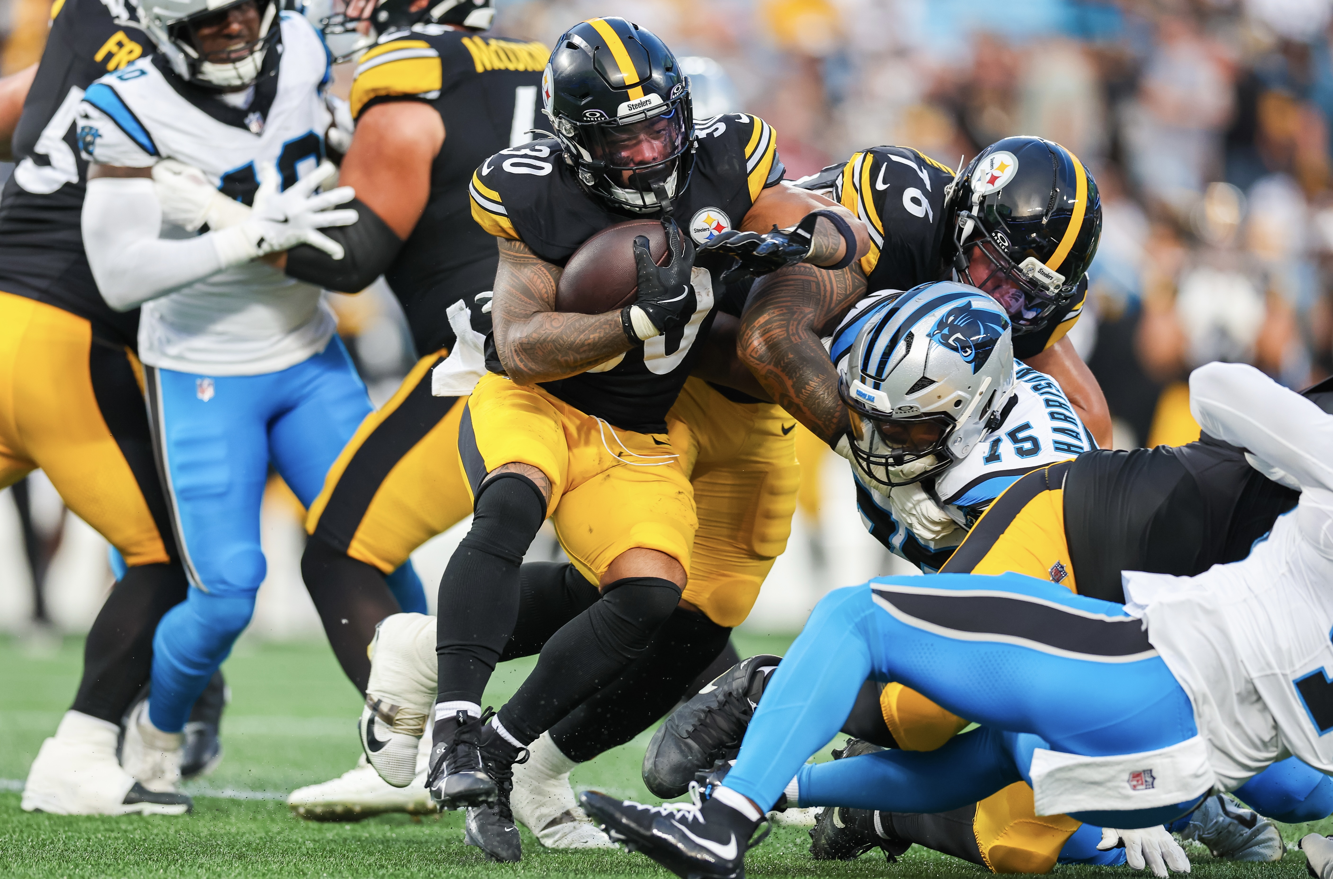 Jaylen Warren seeks running room in the first quarter Thursday night in Charlotte, N.C.