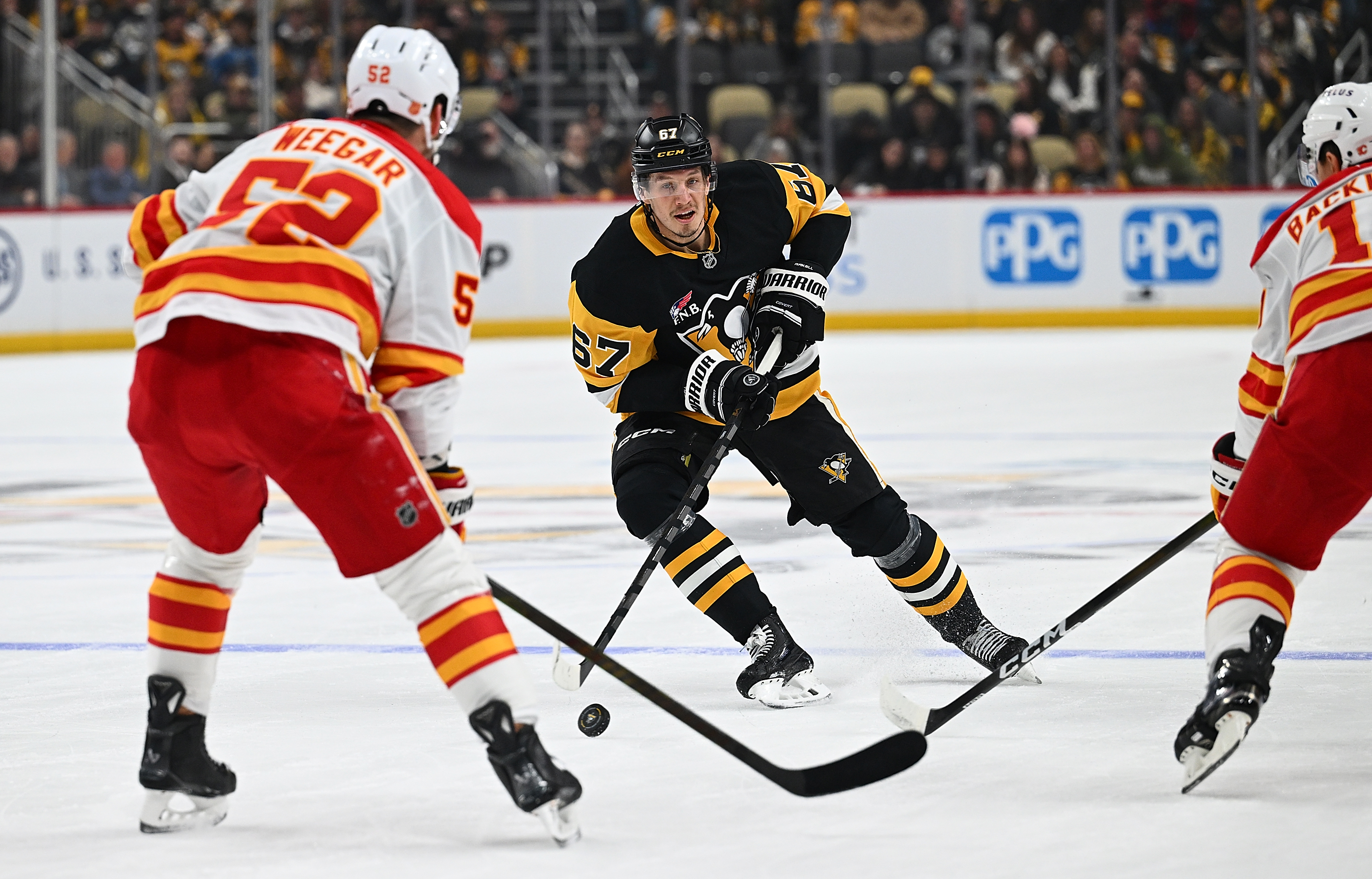 Rickard Rakell skates up ice in the first period Saturday.