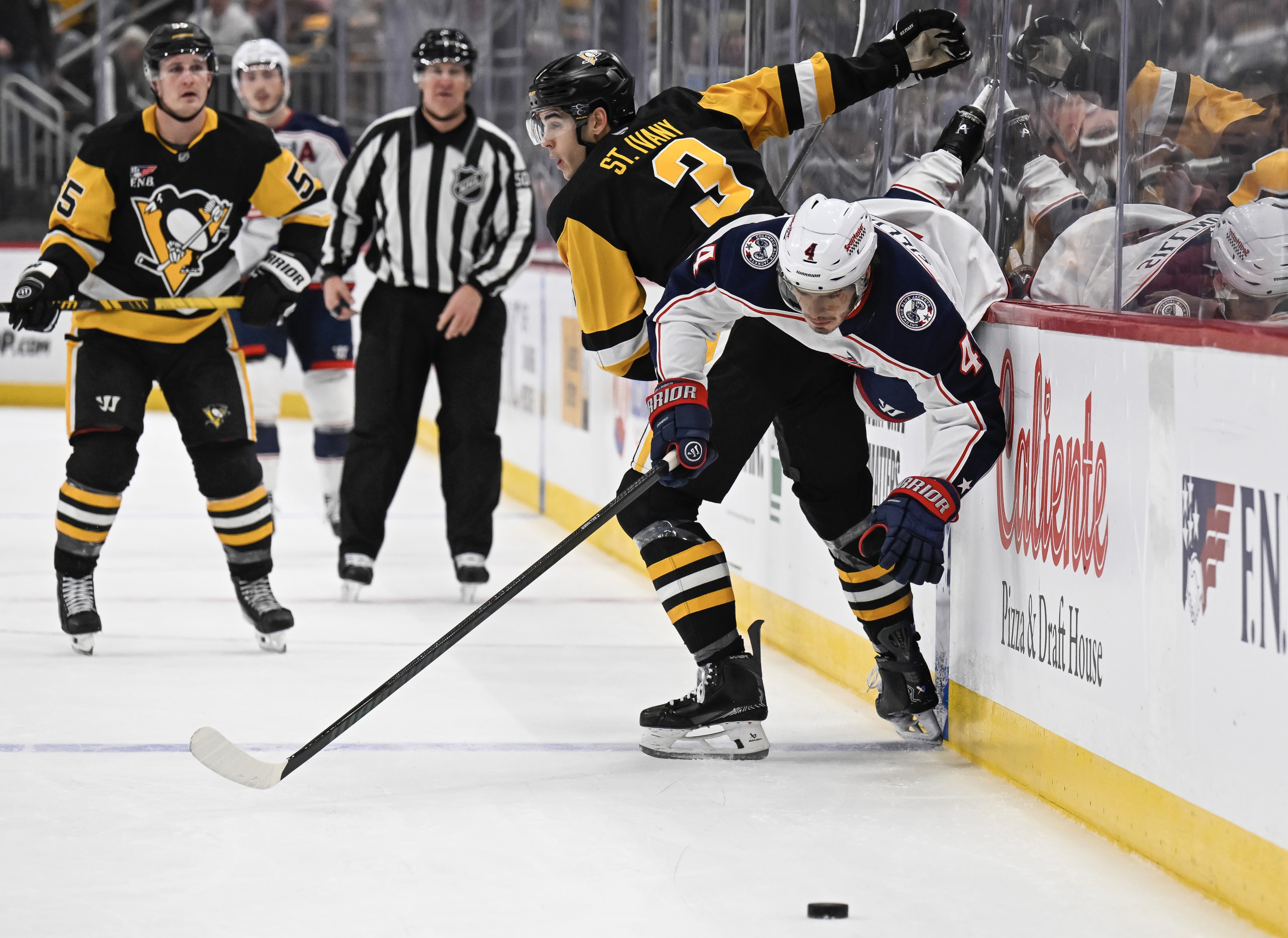 Jack St. Ivany upends the Blue Jackets' Cole Sillinger.