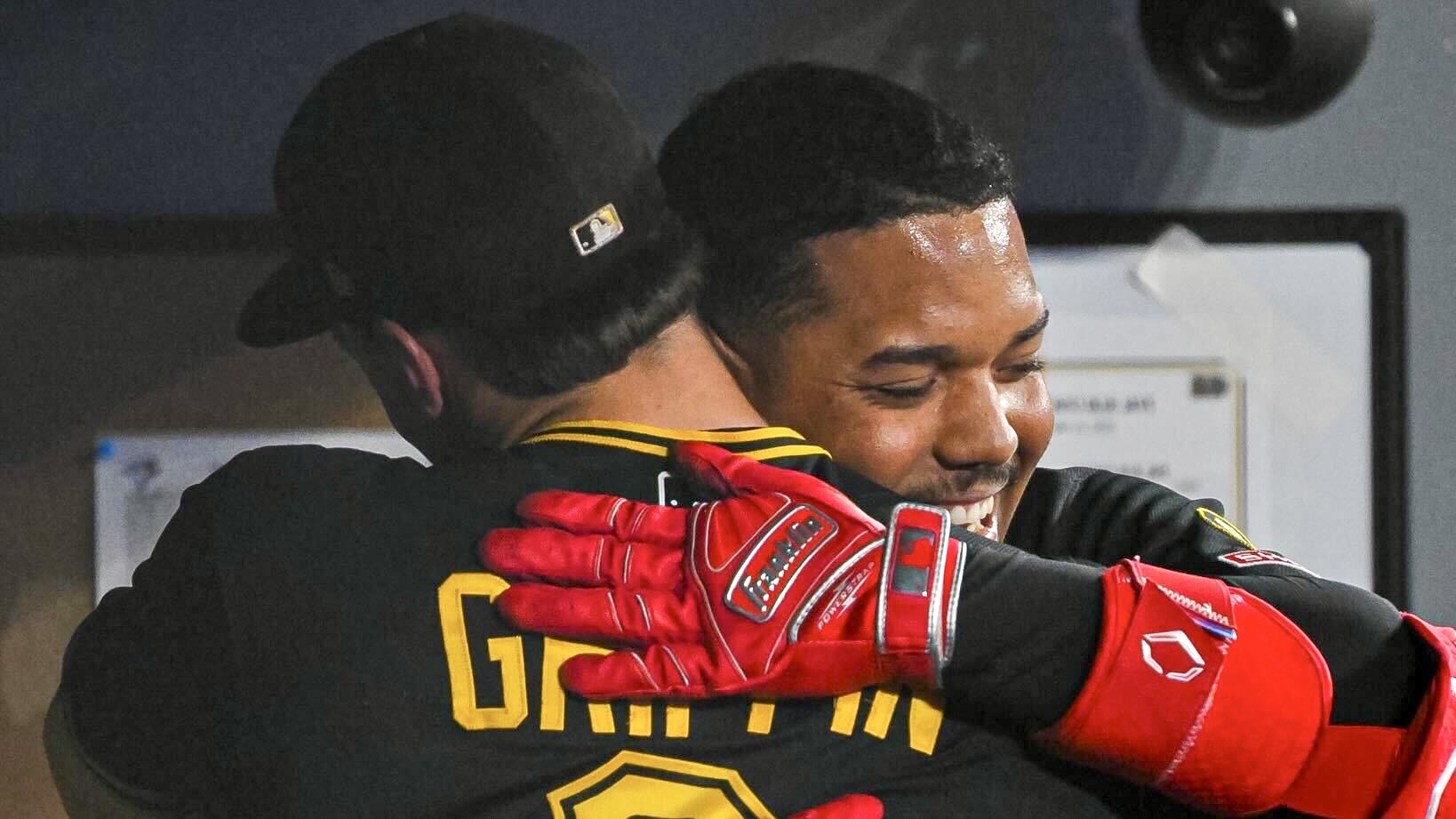 Esmerlyn Valdez gets a hug from Konnor Griffin after his first home run Sunday in Toronto.