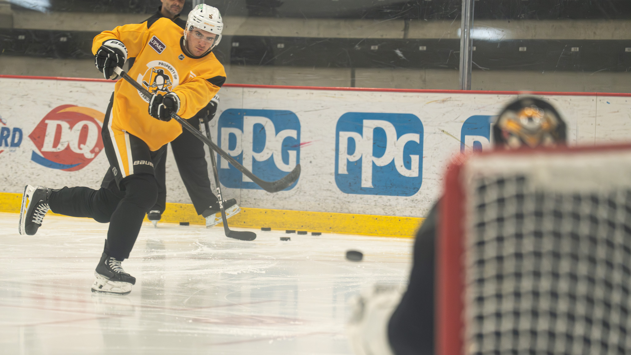 Ryan Shea shoots toward the net.