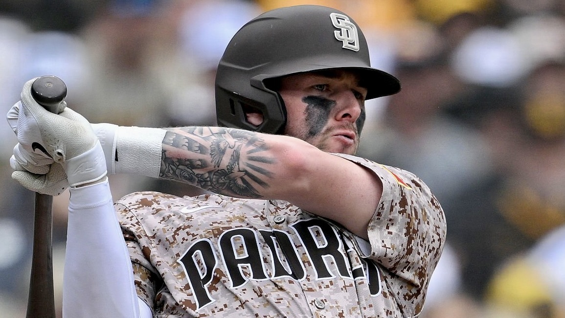 The Padres' Jackson Merrill hits an RBI double in the sixth inning Sunday in San Diego.