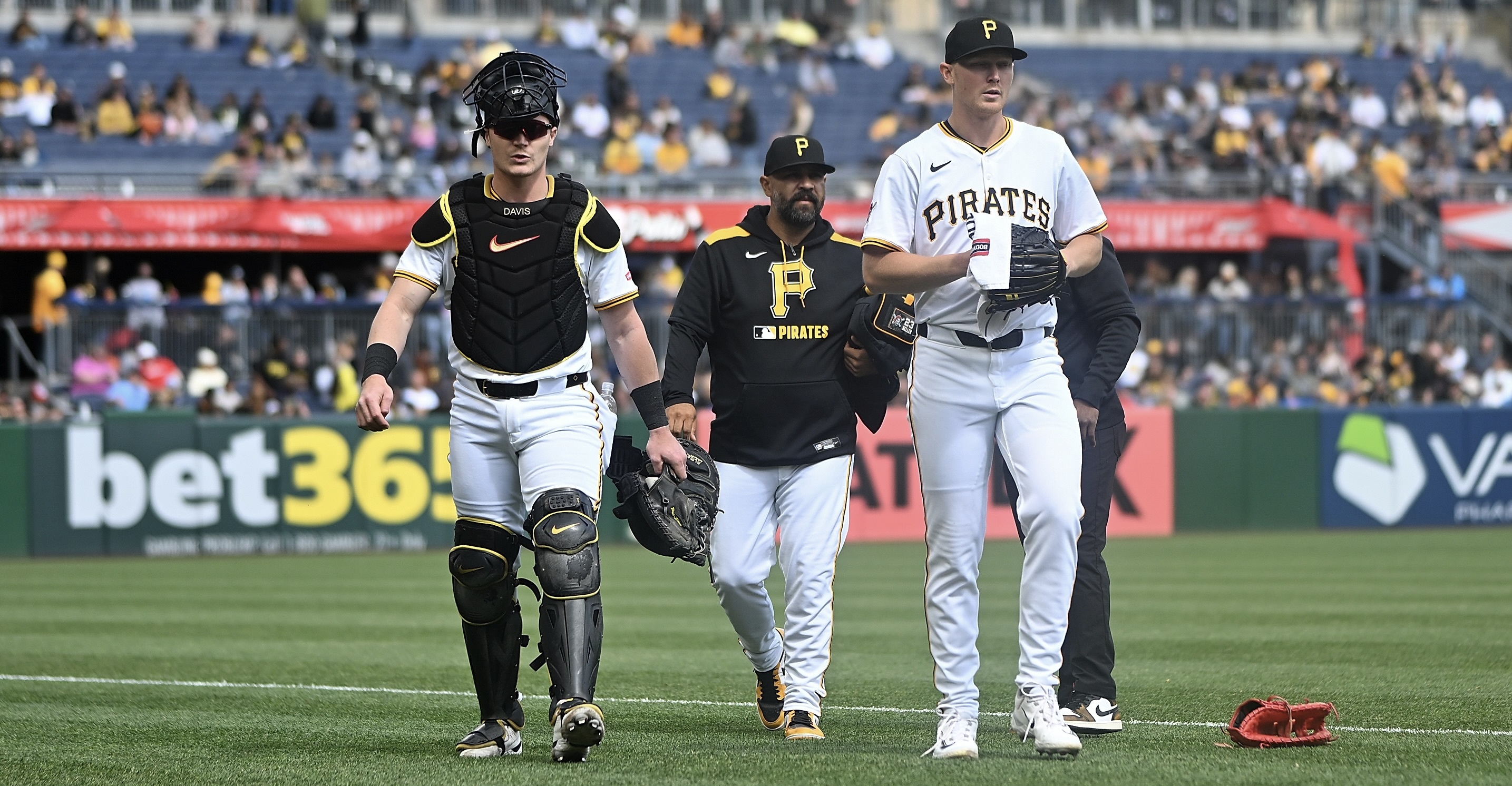 Henry Davis, Oscar Marin and Mitch Keller walk to the dugout before the game Saturday at PNC Park.