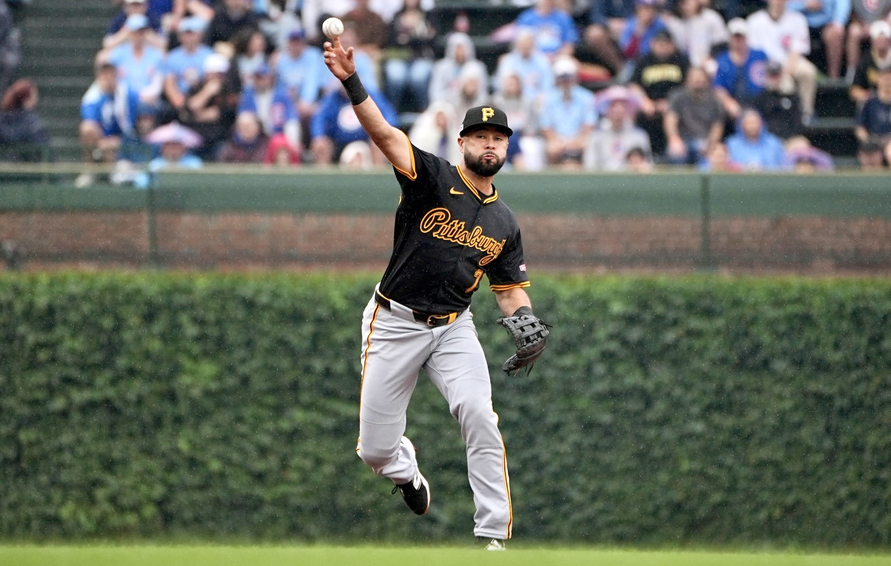 Isiah Kiner-Falefa guns down Cubs' Ian Happ in the fifth inning of the Pirates' 2-1 win at Wrigley Field on Friday.