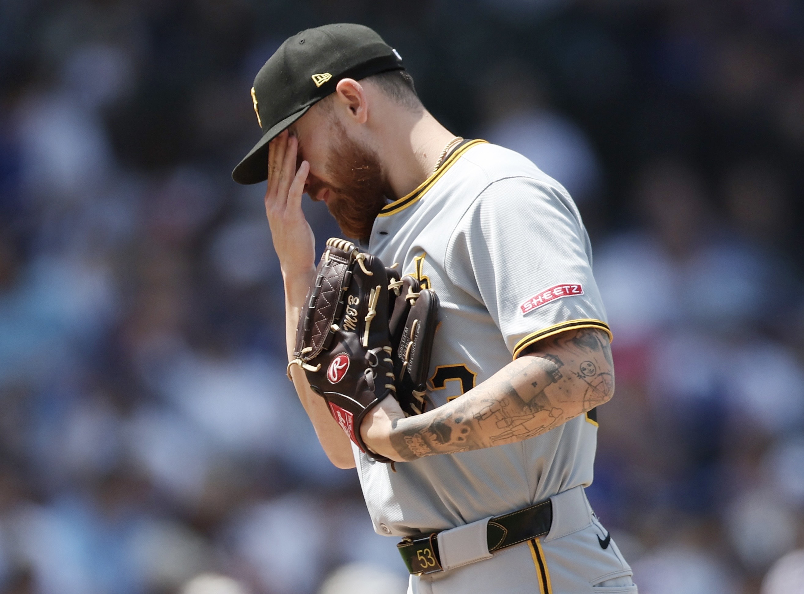 Mike Burrows shows frustration during his start against the Cubs on Saturday at Wrigley Field.