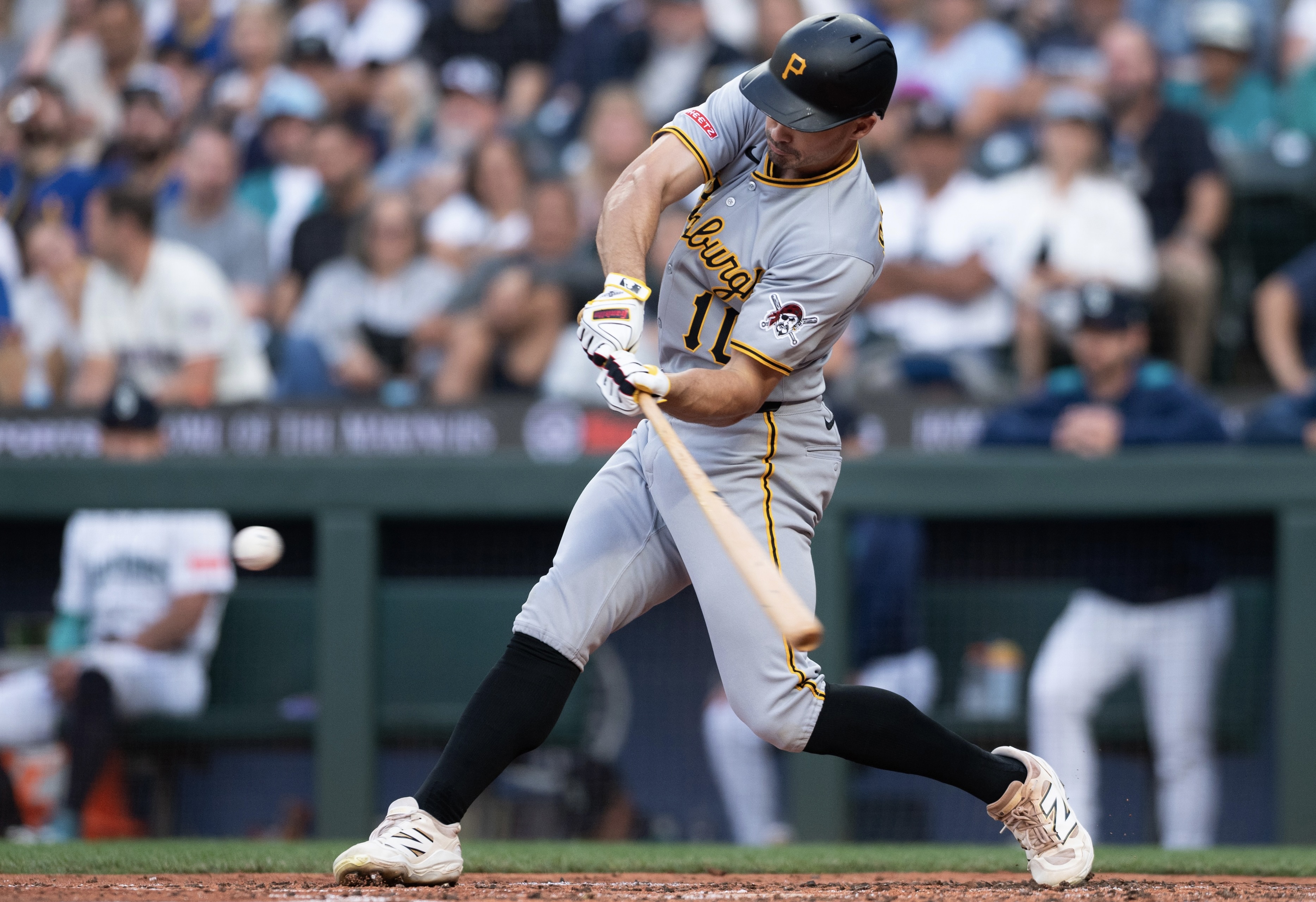 Bryan Reynolds swings and misses Saturday night in Seattle.