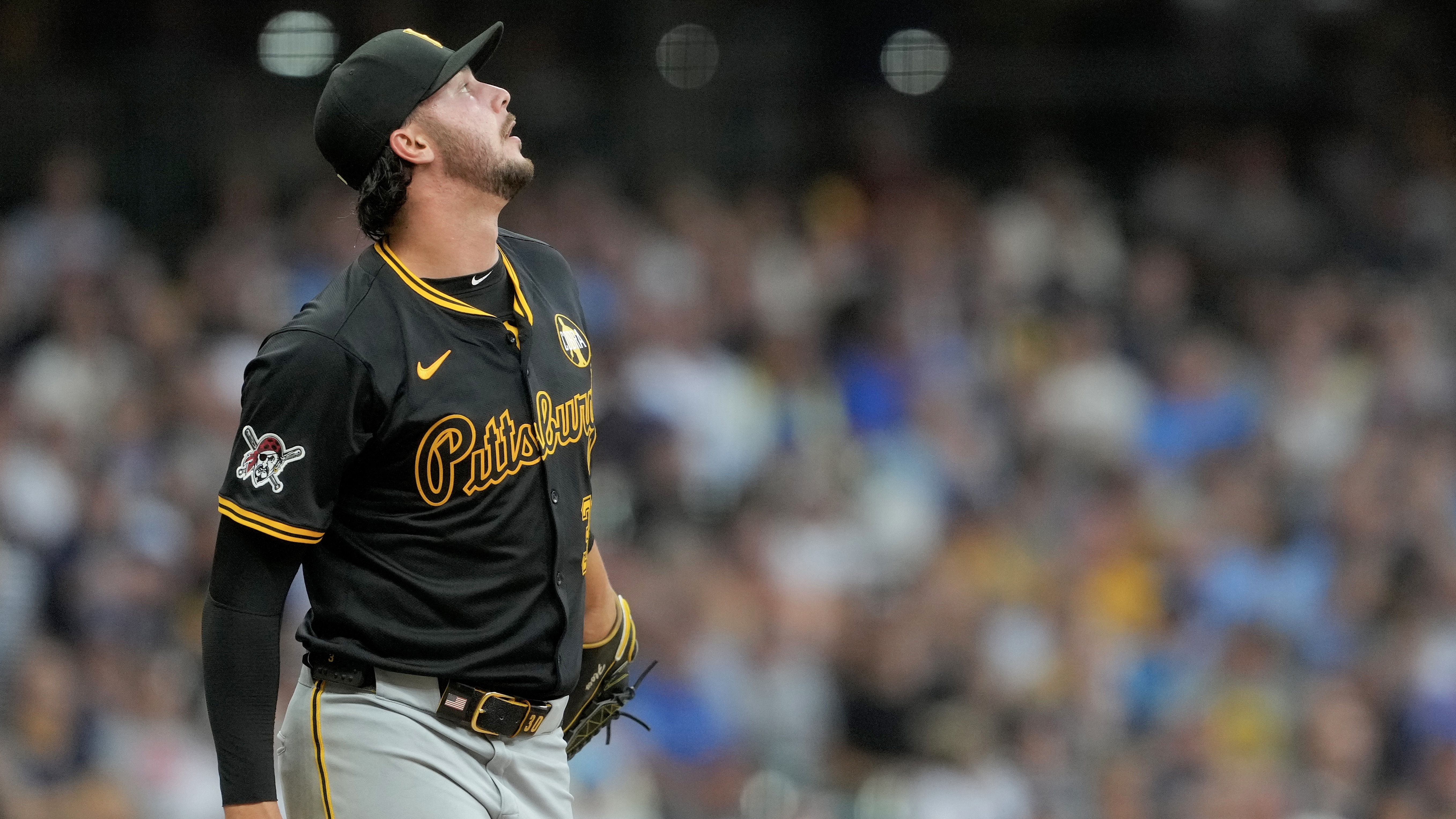 Paul Skenes reacts after a double by the Brewers' Joey Ortiz in the fourth inning Tuesday in Milwaukee.