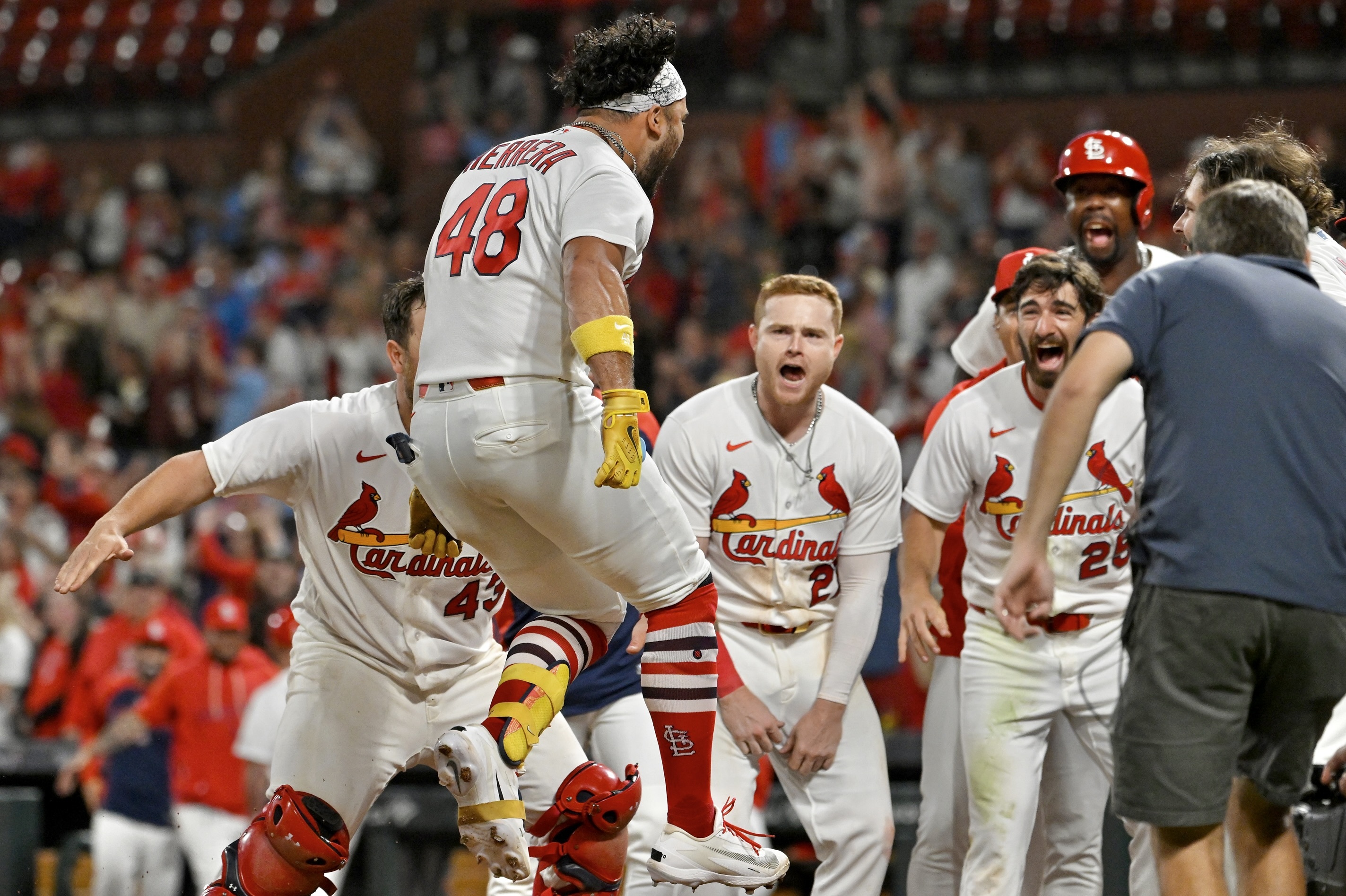 Ivan Herrera celebrates after hitting a three-run home run in the 10th inning Tuesday at Busch Stadium.