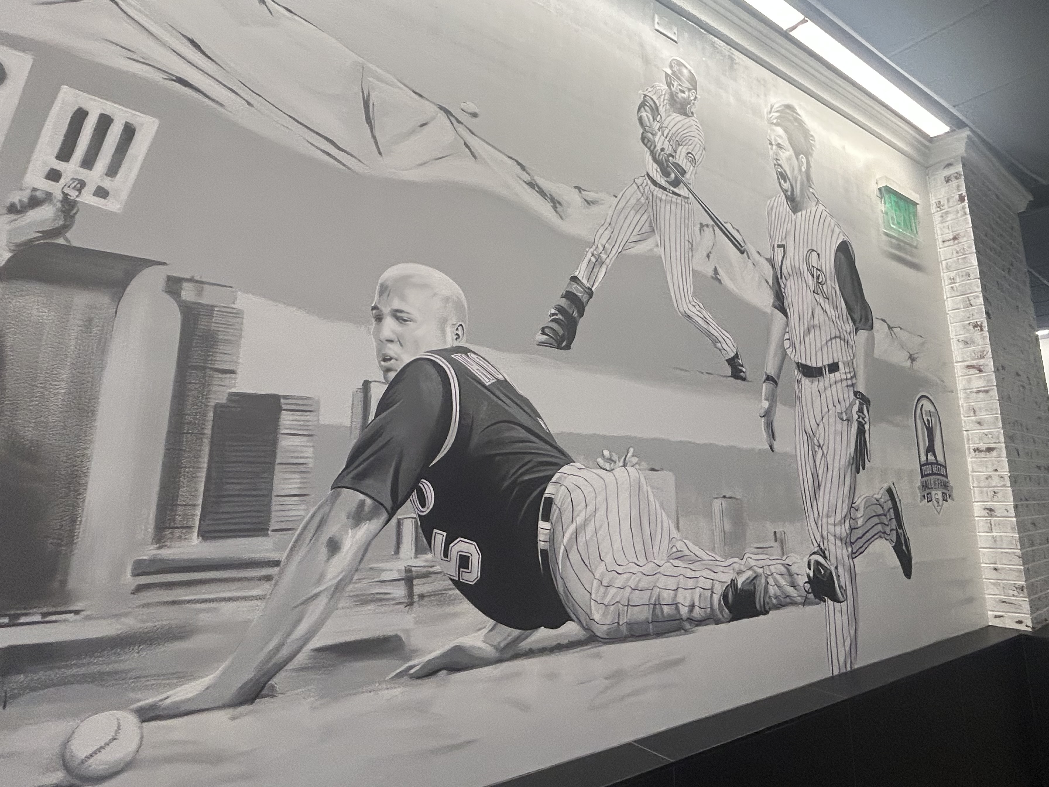 Mural featuring former Rockies stars Matt Holliday, Charlie Blackmon and Todd Helton at Coors Field in Denver.