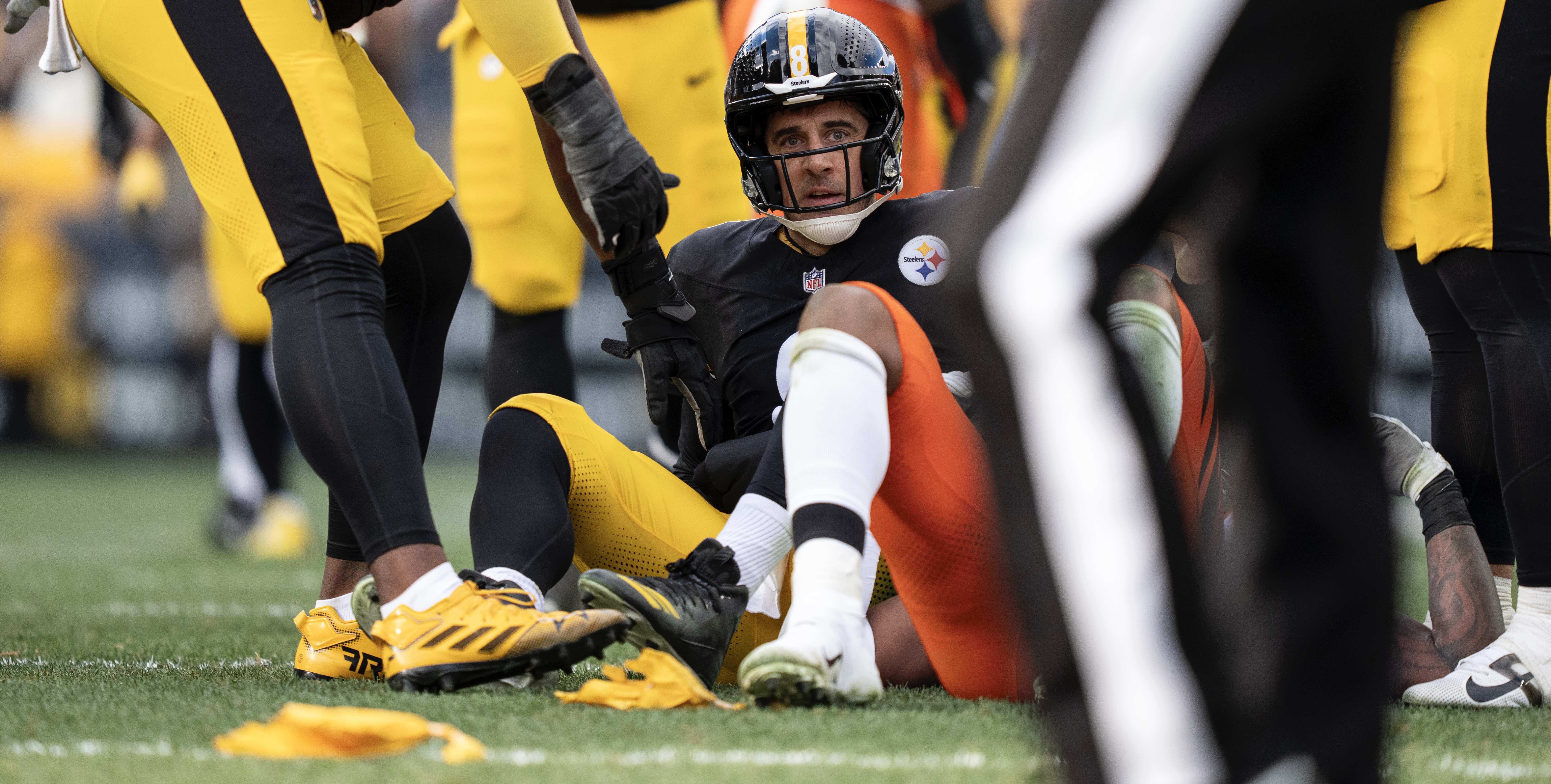 Aaron Rodgers after being sacked during the Steelers' win over the Bengals at Acrisure Stadium.
