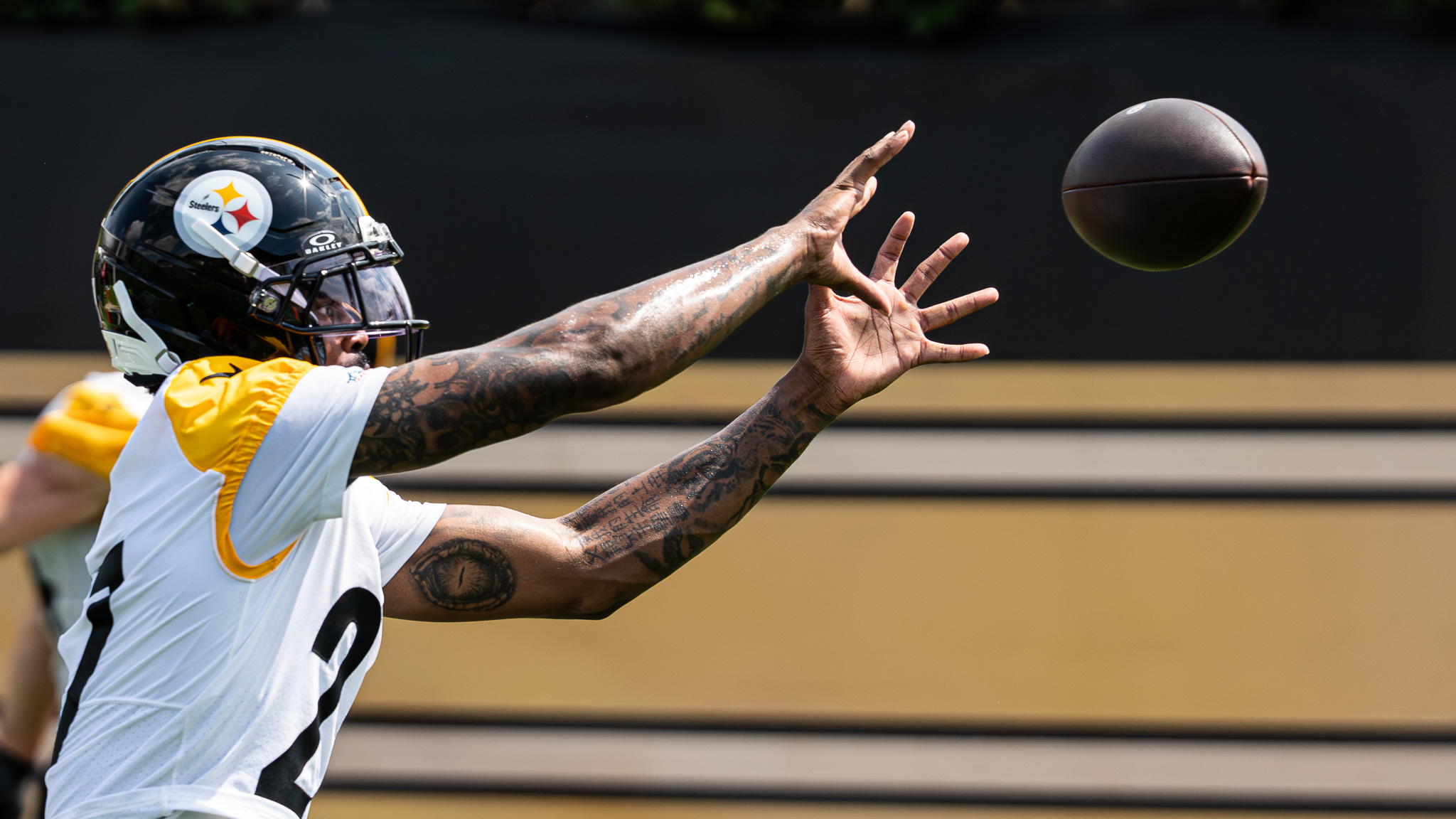 A.T. Perry catches a ball during a wide receiver drill at the UPMC Rooney Sports Complex. 