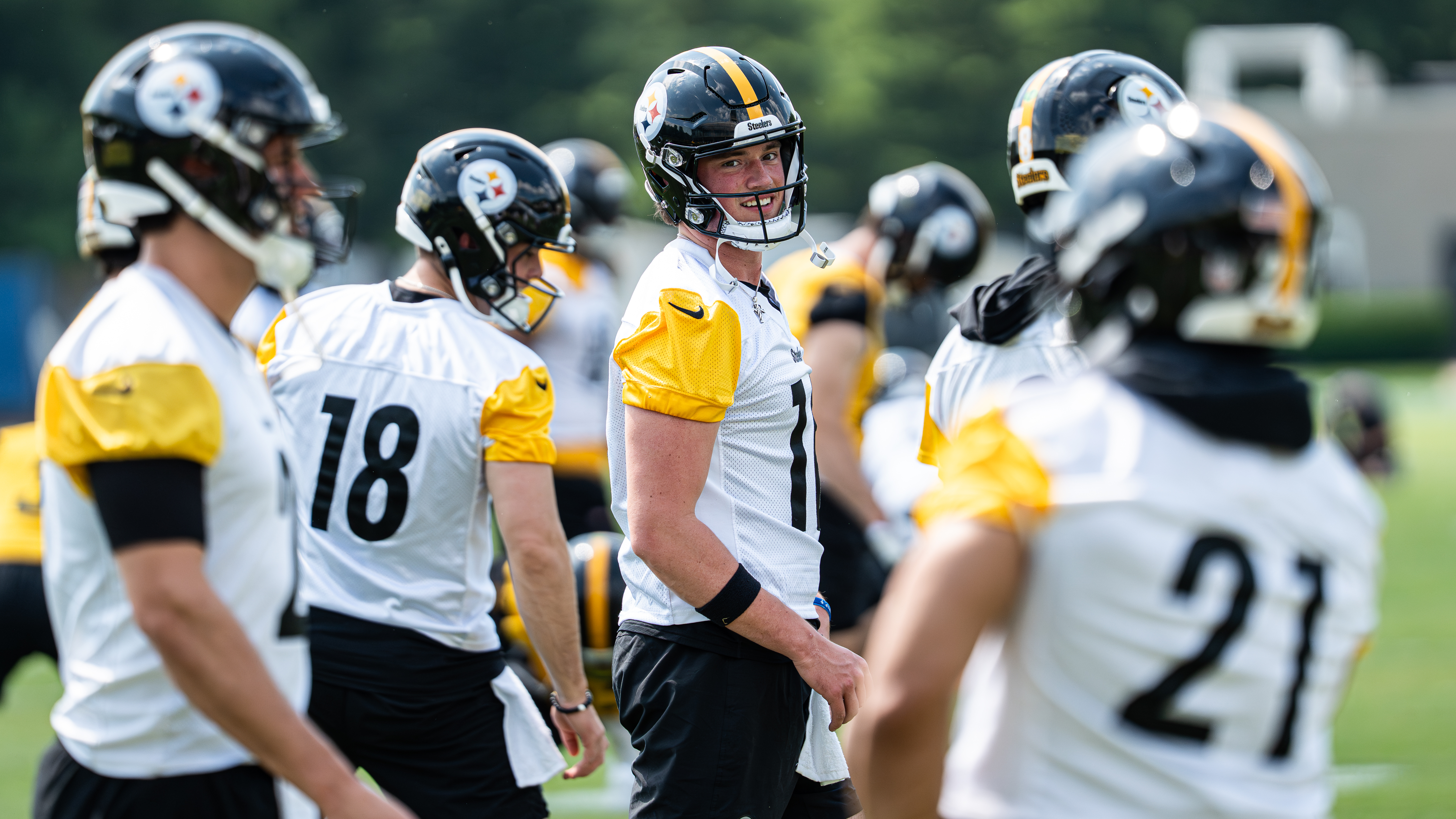 Drew Allar looks toward the sideline during the stretching period. 