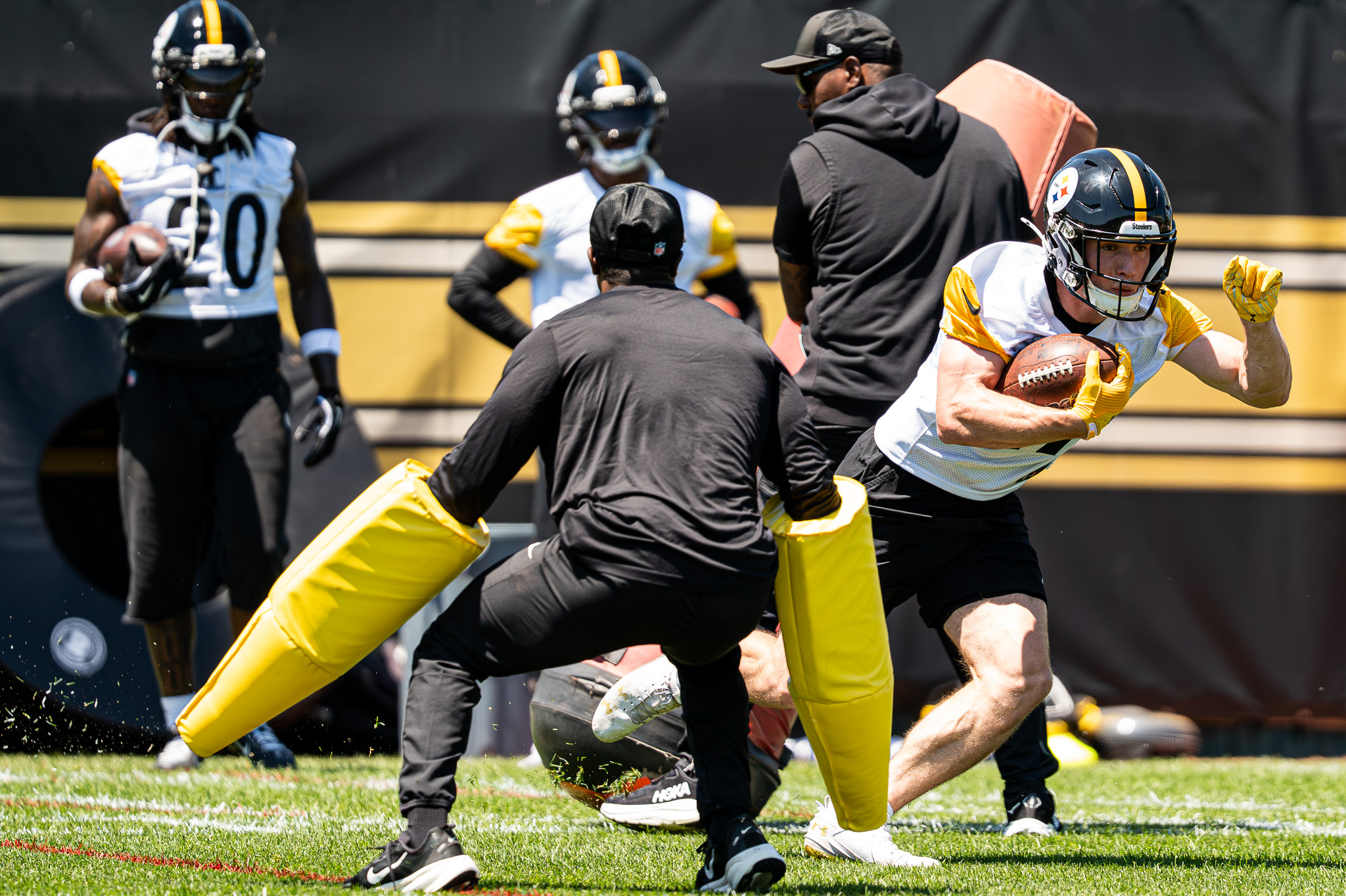 Eli Heidenreich jukes a Steelers team staffer to avoid a blocking pad Wednesday afternoon.  