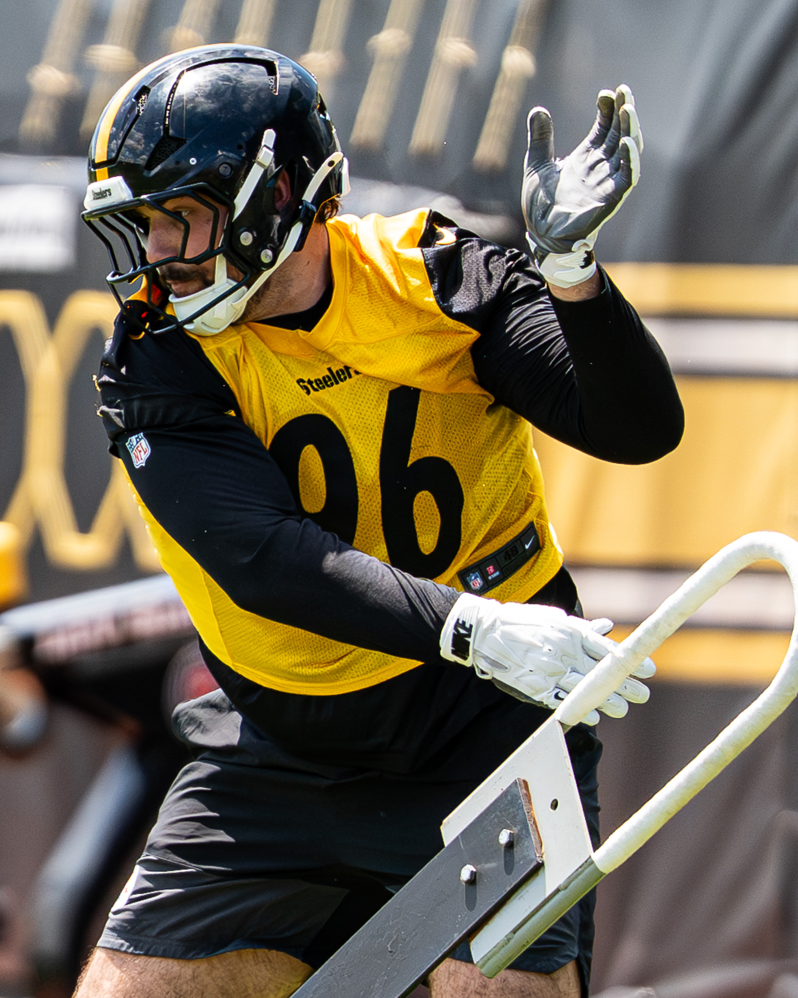Gabriel Rubio slaps a blocking sled Tuesday on the South Side. 