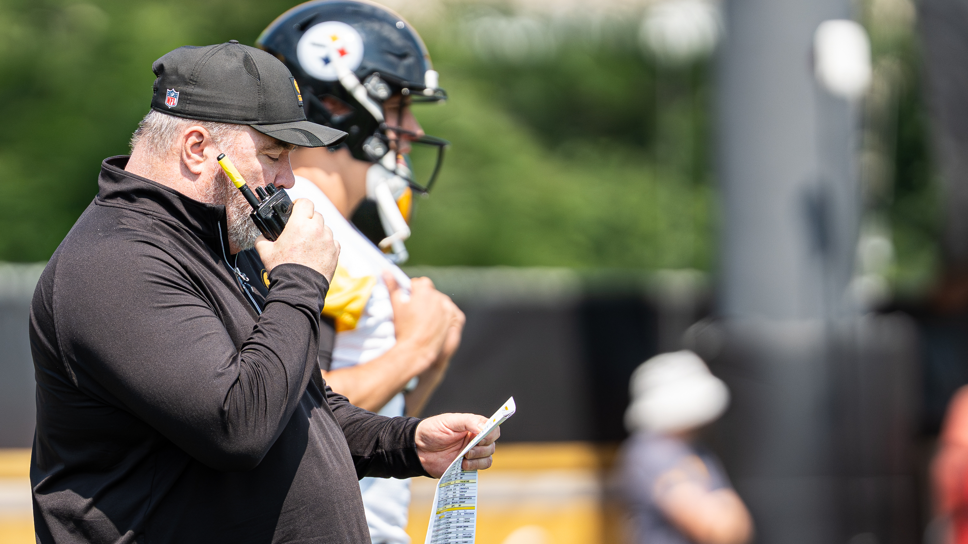 Mike McCarthy calls a play during OTAs.