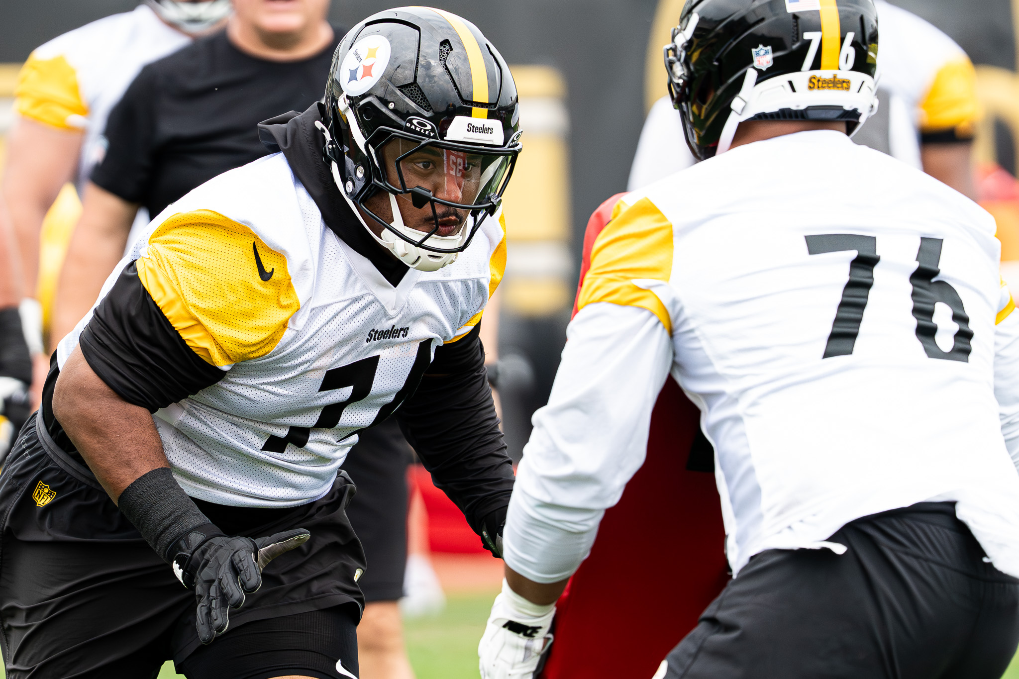 Spencer Anderson prepares to throw a block during offensive line drills on the South Side. 