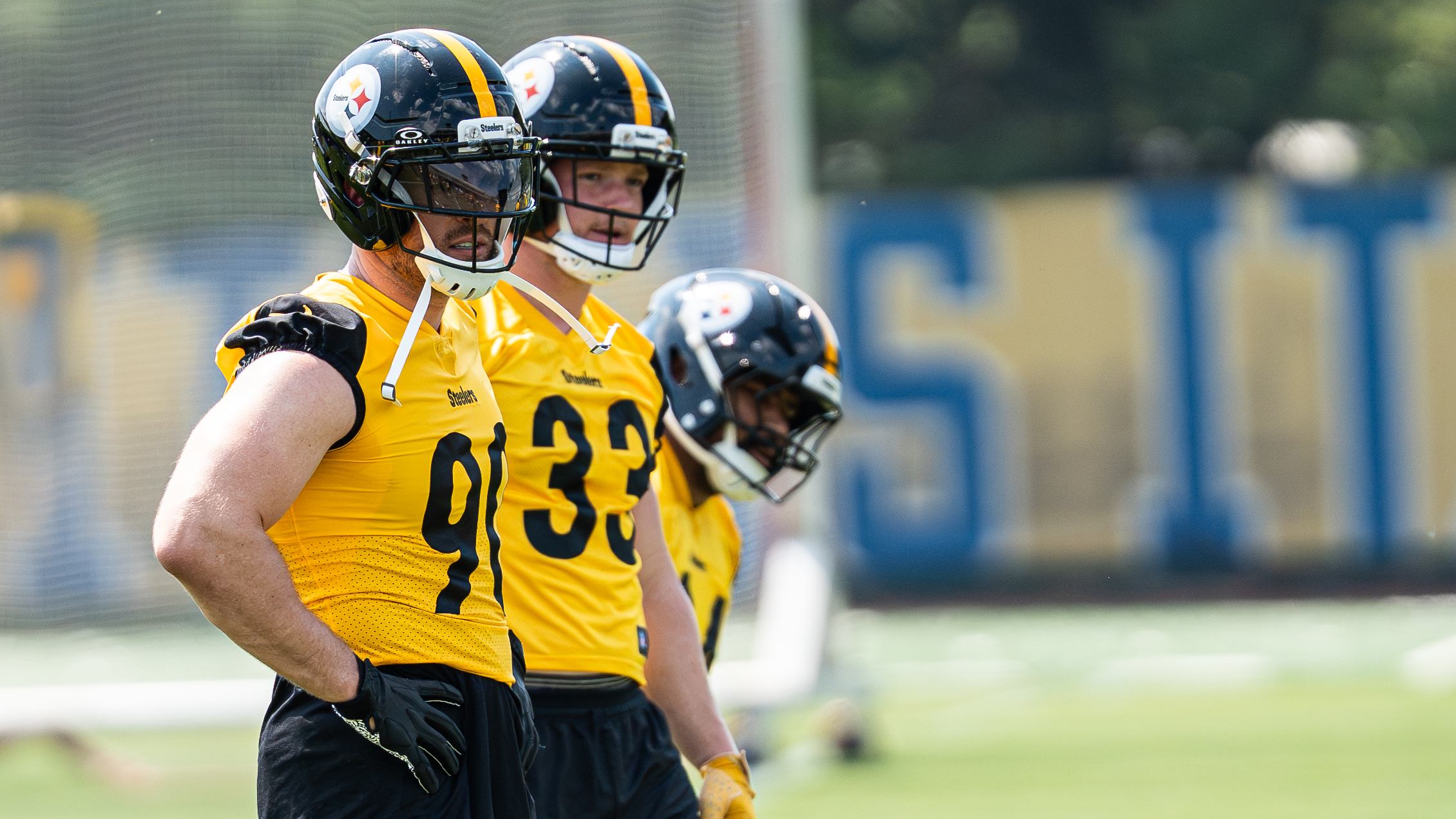 T.J. Watt looks on.