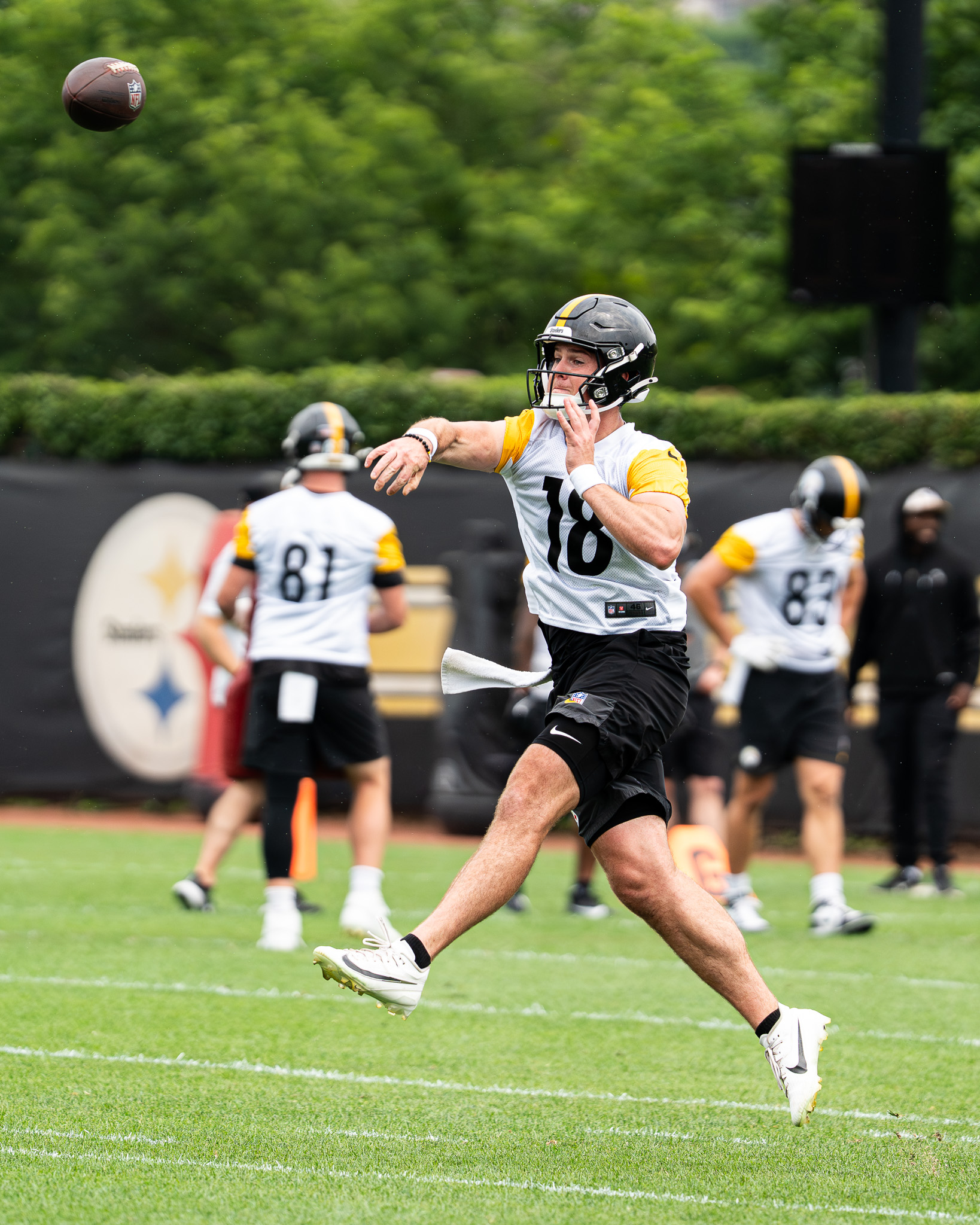 Will Howard throws toward a net during a passing drill Tuesday on the South Side. 