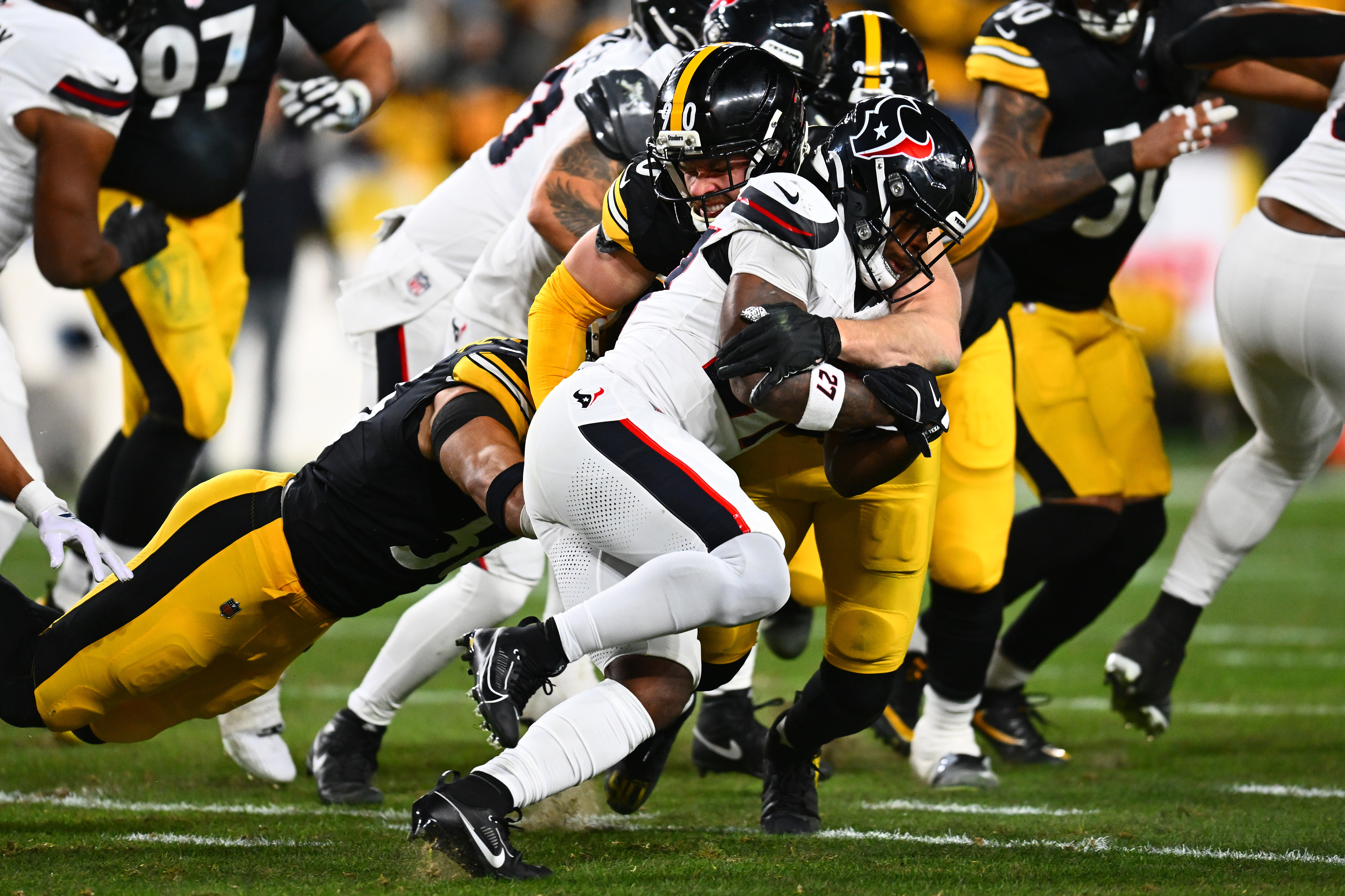 T.J. Watt tackles Woody Marks during the Steelers' 30-6 loss to the Texans on Monday night at Acrisure Stadium.