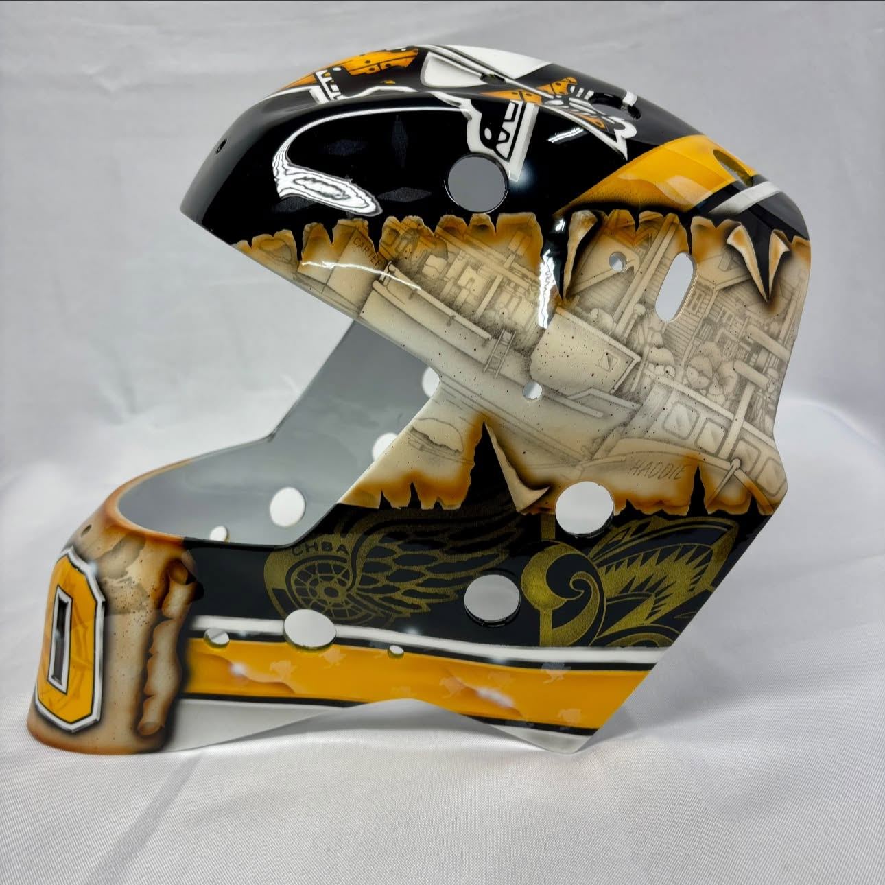 Emergency backup goalie Mike Chiasson used Kittanning, Pa. artist Scott Williams for his mask design this year.