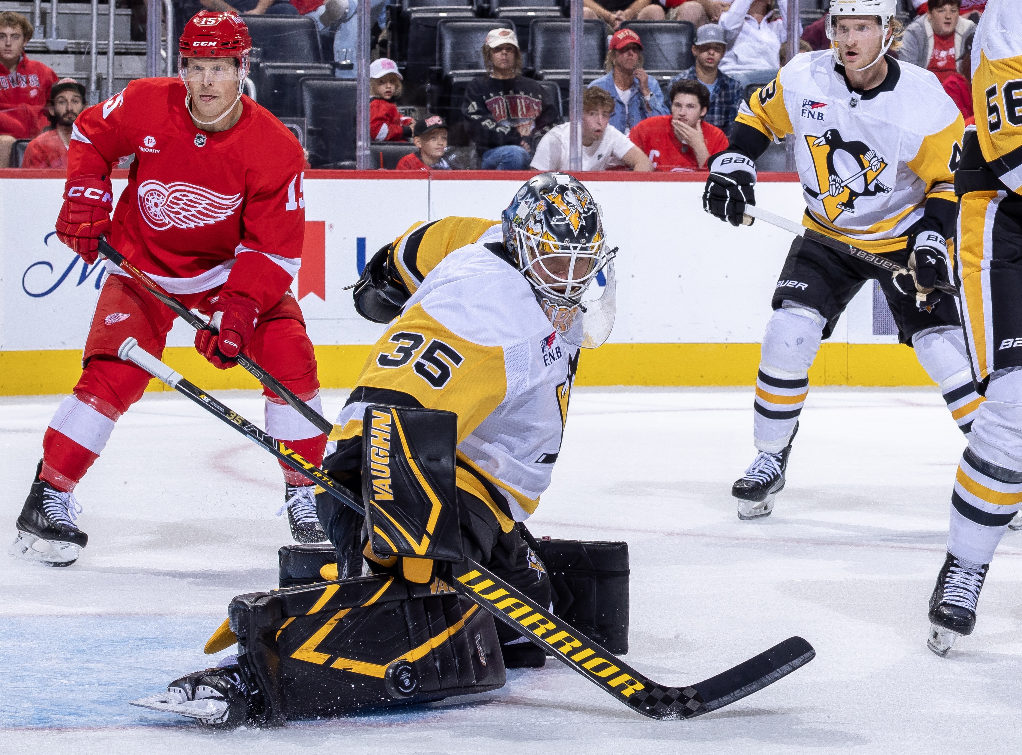 Tristan Jarry makes a save on Monday in Detroit