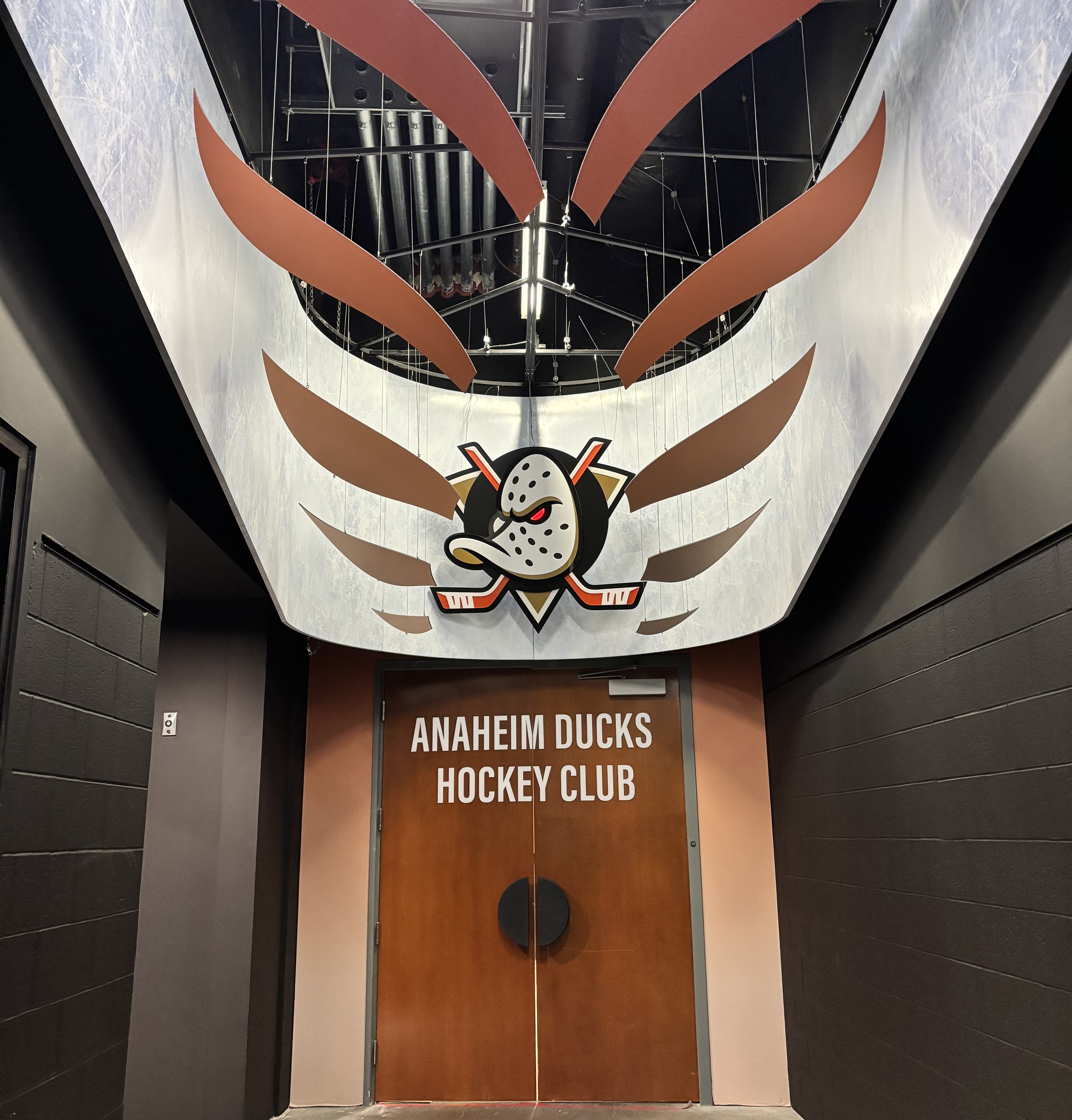 Door to Ducks' locker room.