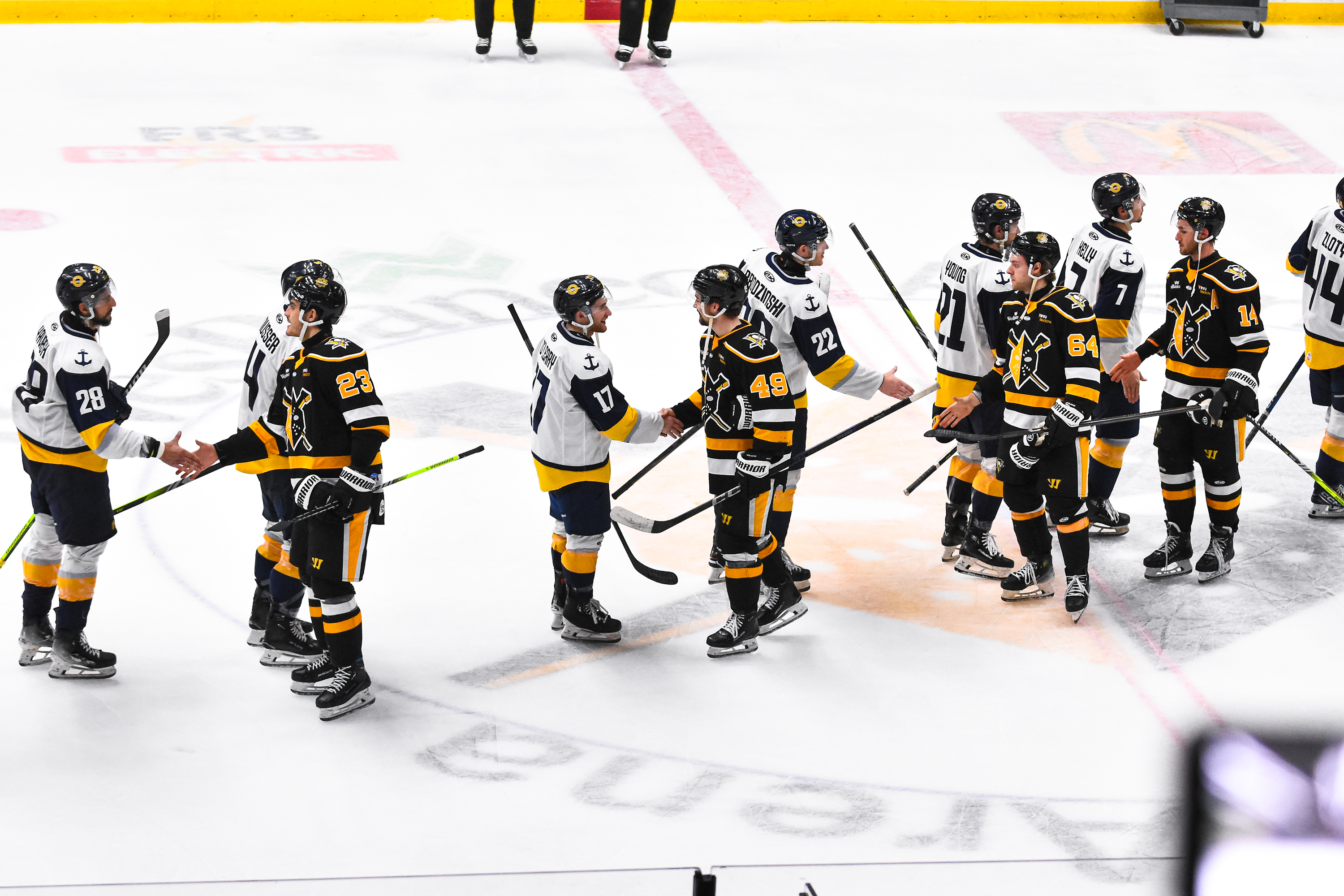 The Nailers and Admirals shake hands after Game 5 on Saturday in Wheeling, W.Va.