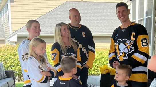 Crosby re-signs for two years at same pay, 'just glad that it's done' taken in Buffalo, N.Y. (Penguins)