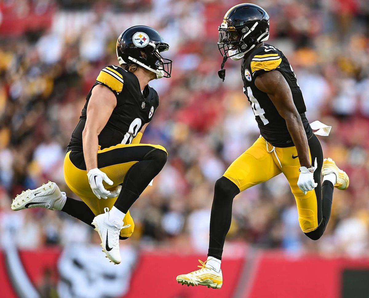 Kenny Pickett and George Pickens celebrate their 33-yard touchdown in the first quarter Friday night in Tampa, Fla. Kenny Pickett and George Pickens celebrate their 33-yard touchdown in the first quarter Friday night in Tampa, Fla.