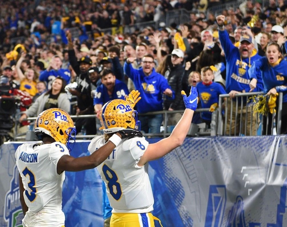 Jordan Addison and Kenny Pickett play to the Pitt fans Dec. 4, 2021, in Charlotte, N.C. Jordan Addison and Kenny Pickett play to the Pitt fans Dec. 4, 2021, in Charlotte, N.C.