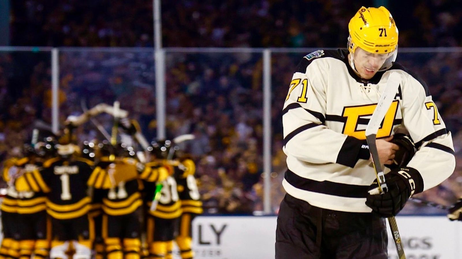 Freeze Frame: Penguins' Evgeni Malkin beats Linus Ullmark, but not the buzzer in Winter Classic
