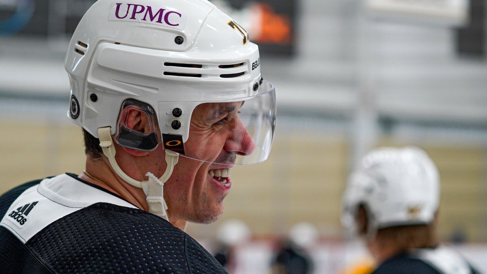 Malkin does pushups with son on back