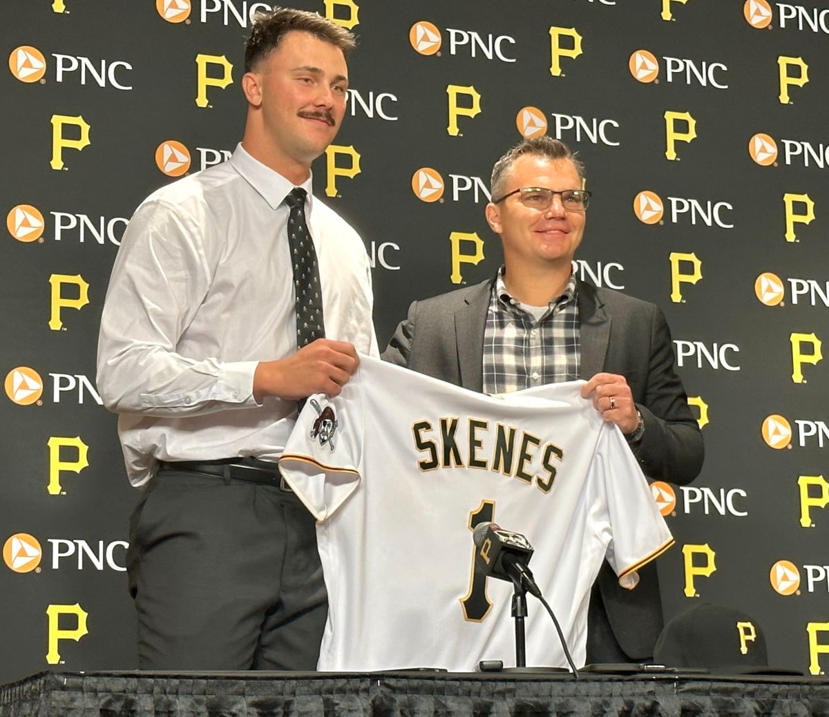 Paul Skenes and Ben Cherington pose with his jersey in his introduction Tuesday. Paul Skenes and Ben Cherington pose with his jersey in his introduction Tuesday.