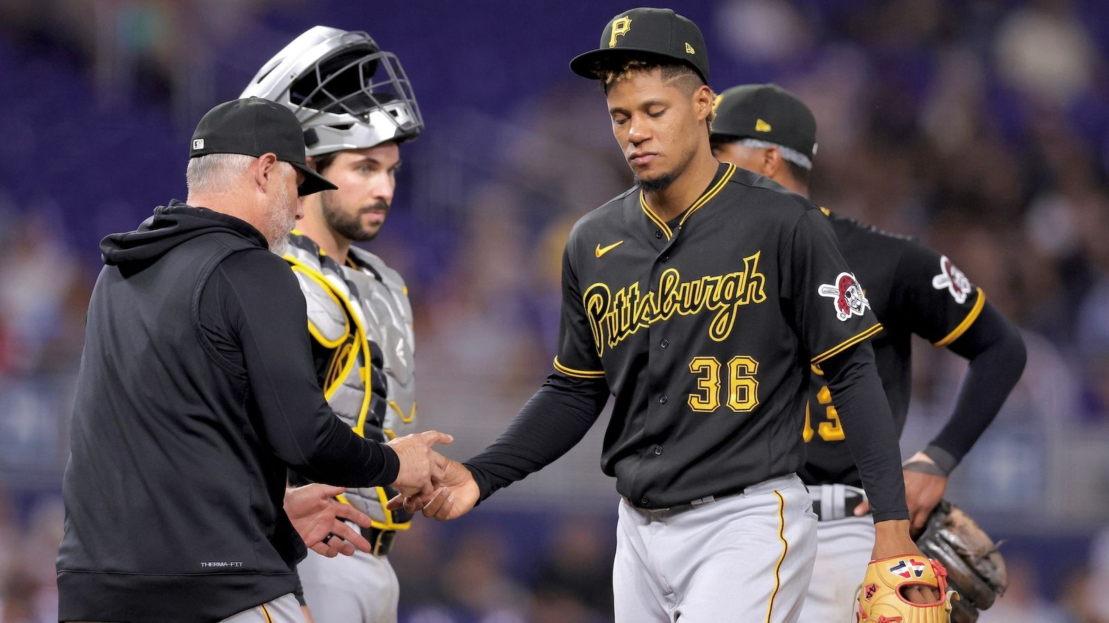 Derek Shelton of the Pittsburgh Pirates puts himself between home News  Photo - Getty Images