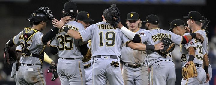 The Pirates celebrate after the final out Monday night in San Diego. The Pirates celebrate after the final out Monday night in San Diego.