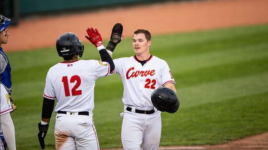 Henry Davis celebrates after scoring a run. Henry Davis celebrates after scoring a run.