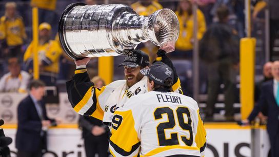 THE GOALTENDERS: Fleury passes Cup, baton to Murray taken in Nashville, Tenn. (Stanley Cup)
