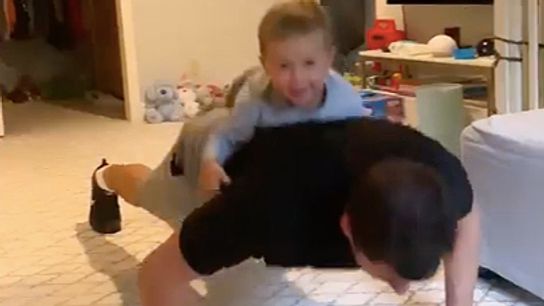 Malkin does pushups with son on back taken at PPG Paints Arena (Courtesy of Point Park University)