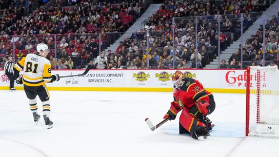Short-handed Penguins 'dig in' for pivotal points taken in Ottawa (Top story). Photo by GETTY