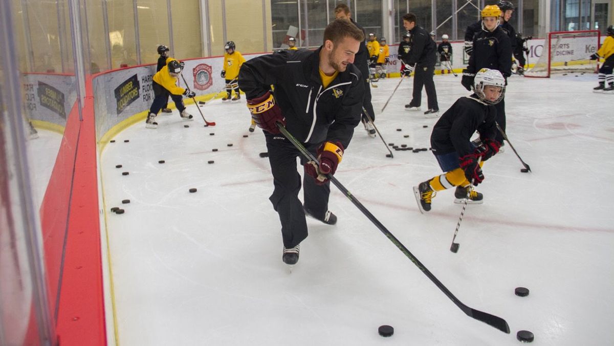Adam Johnson in a youth clinic with the Penguins in 2017. Adam Johnson in a youth clinic with the Penguins in 2017.