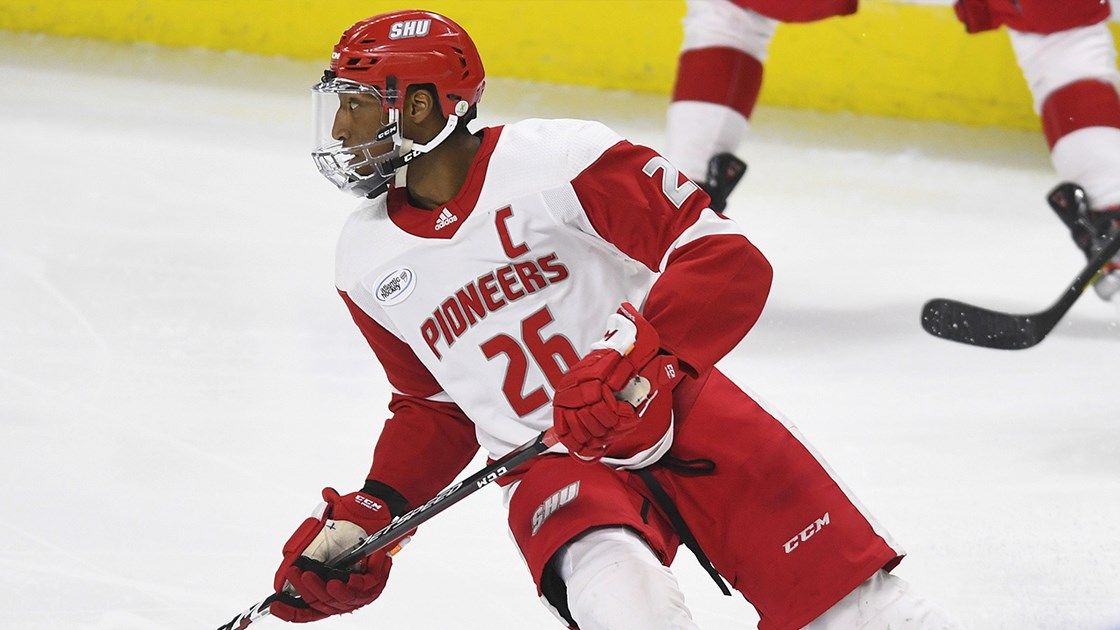 Marc Johnstone with Sacred Heart University