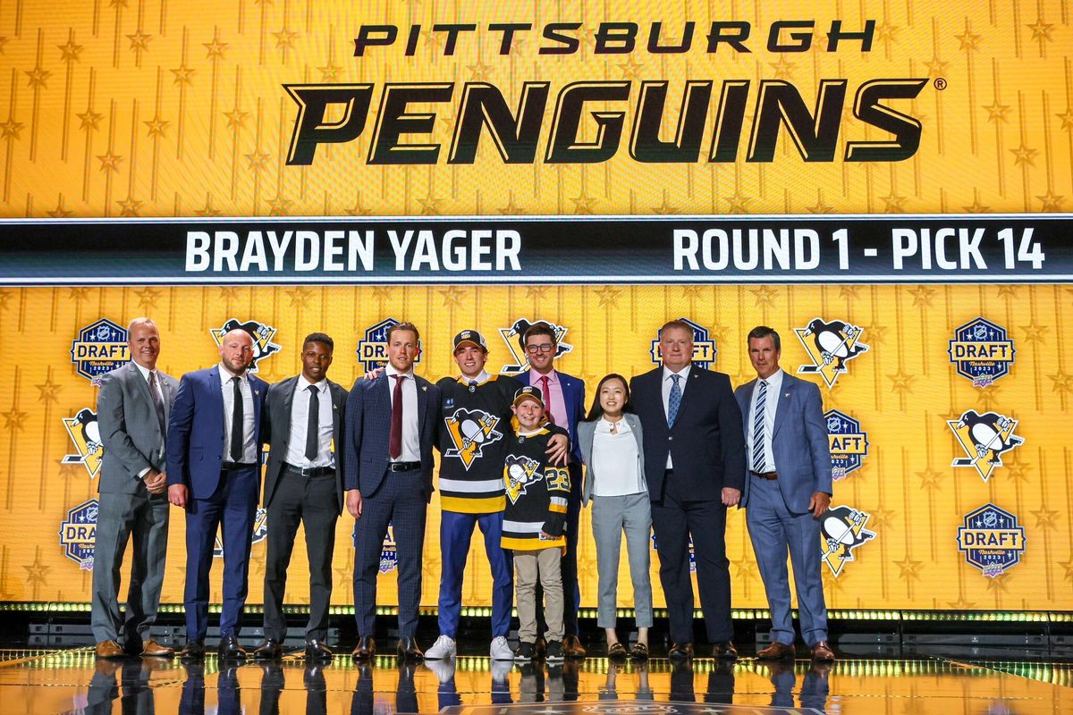 The Penguins' front office and Brayden Yager on stage Wednesday in Nashville, Tenn.