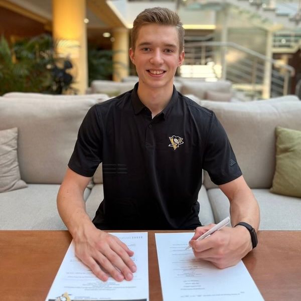 Sergei Murashov signs his entry-level contract on Tuesday. Sergei Murashov signs his entry-level contract on Tuesday.