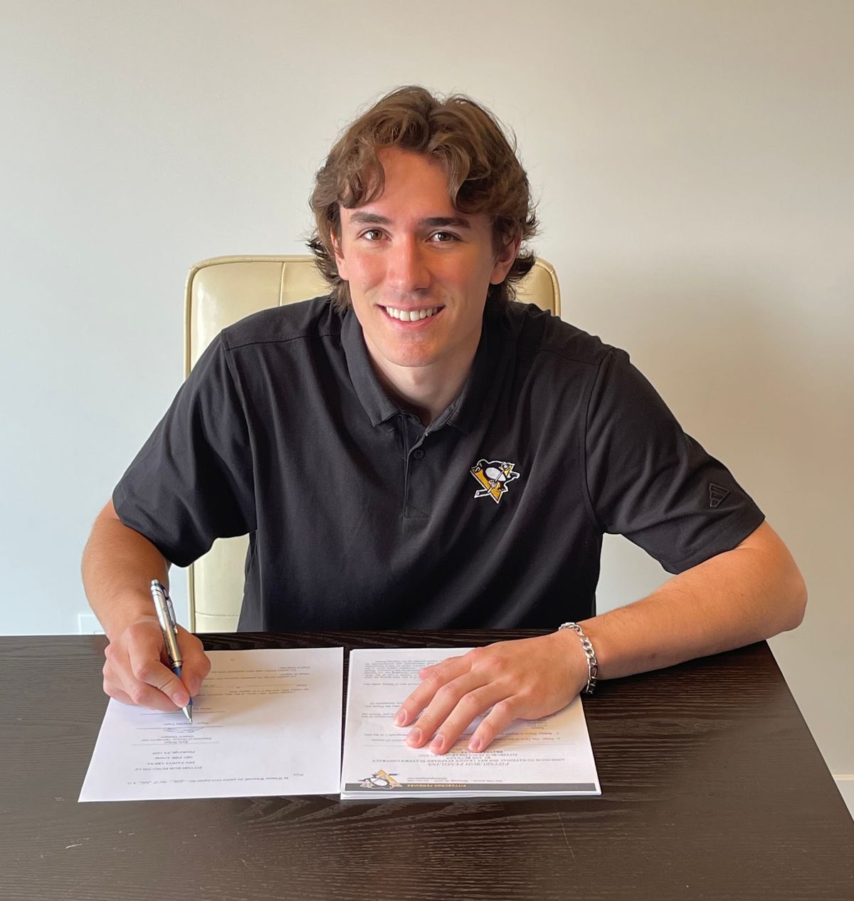 Brayden Yager signs his entry-level contract on Thursday. Brayden Yager signs his entry-level contract on Thursday.