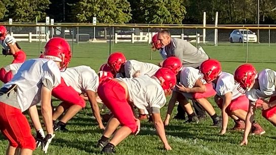 His life no longer unraveling, Jeff Hartings shepherds a football flock taken in Worthington, Ohio (In-depth)