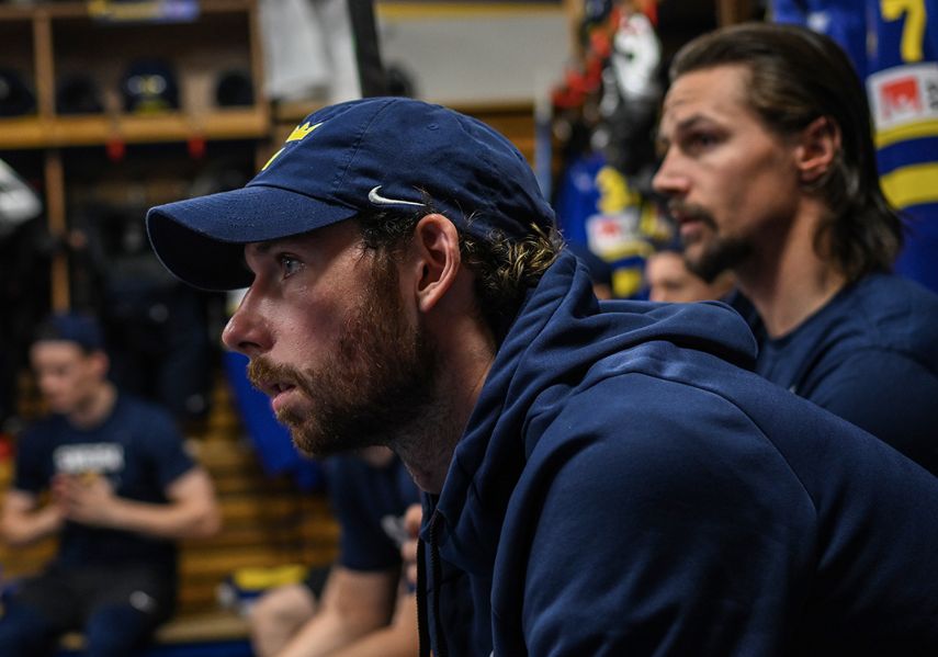 Marcus Pettersson and Erik Karlsson beside each other in the locker room on Monday.