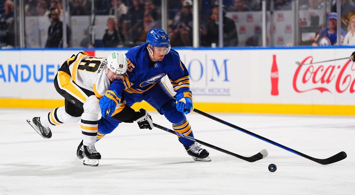 Valtteri Puustinen battles for a puck with Connor Clifton Saturday night in Buffalo, N.Y. Valtteri Puustinen battles for a puck with Connor Clifton Saturday night in Buffalo, N.Y.